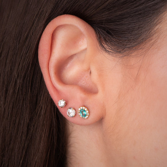 18K PENDIENTES ORO AMARILLO PIEDRA OVAL TOPACIO PARAIBA Y CIRCONITAS. 6,5 X 5,5 MM. CIERRE PRESION