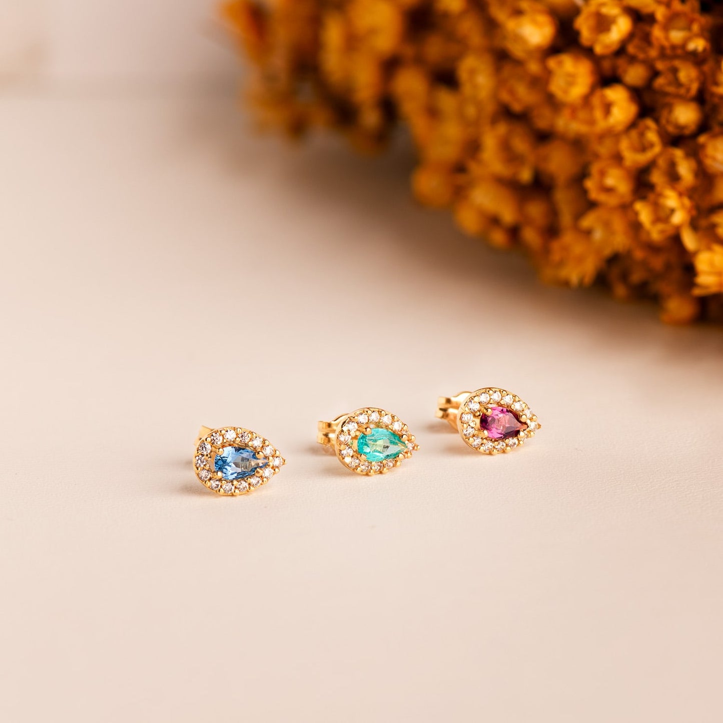18K PENDIENTES ORO AMARILLO PIEDRA GOTA TOPACIO PARAIBA Y CIRCONITAS. 8,5 X 6 MM. CIERRE PRESION