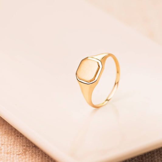 18K SELLO ORO AMARILLO MACIZO SIN FORRAR OCTOGONAL. ZONA DE GRABADO: 8X8 MM