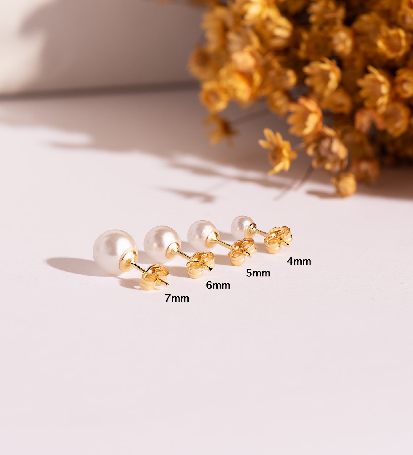 18K PENDIENTES ORO AMARILLO PERLA CON CASQUILLA. MEDIDA: 7 MM. CIERRE PRESION