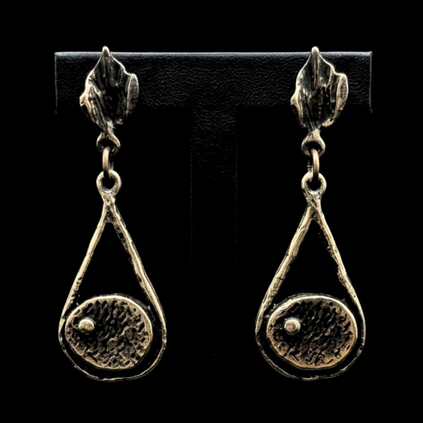 pendiente de bronce escultura joyeria osnor zamak