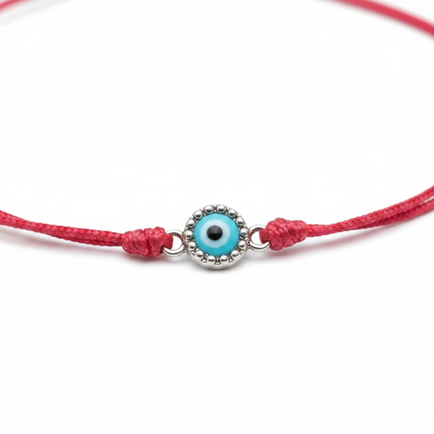 Pulsera de Hilo Rojo Ajustable con Ojo Turco de Plata – Unisex. Joyeria Osnor
