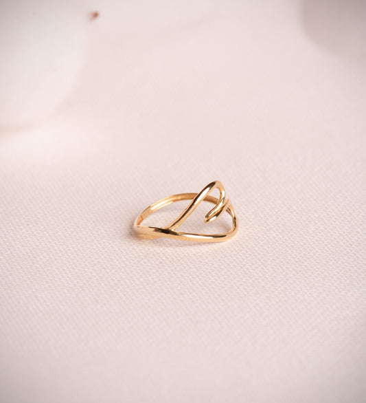 18K SORTIJA ORO AMARILLO CORAZON CRUZADO EN BRILLO. ANCHO: 12 MM C. AMOR
