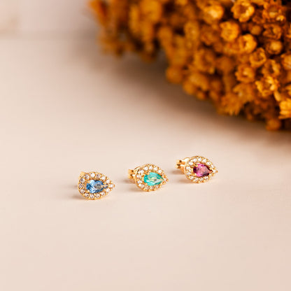 18K PENDIENTES ORO AMARILLO PIEDRA GOTA AZUL Y CIRCONITAS. 8,5 X 6 MM. CIERRE PRESION