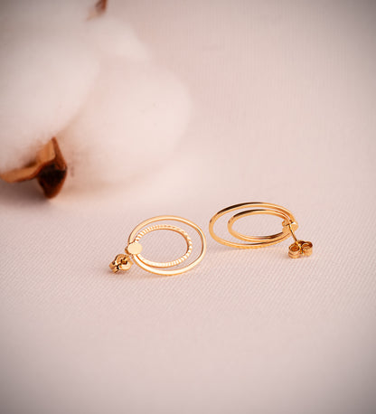 18K PENDIENTES ORO AMARILLO DOBLE ARO OVAL LISO Y TALLADO. MEDIDA: 19X13 MM. CIERRE PRESION