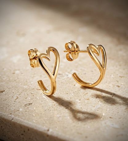18K PENDIENTES ORO AMARILLO MEDIO ARO CORAZON CALADO EN BRILLO. MEDIDA: 13 X 6,5 MM. CIERRE PRESION C. AMOR
