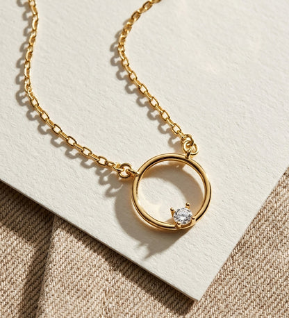 18K GARGANTILLA ORO AMARILLO MOTIVO REDONDO CON CIRCONITA. ANCHO: 12MM CADENA: 40 2 CM