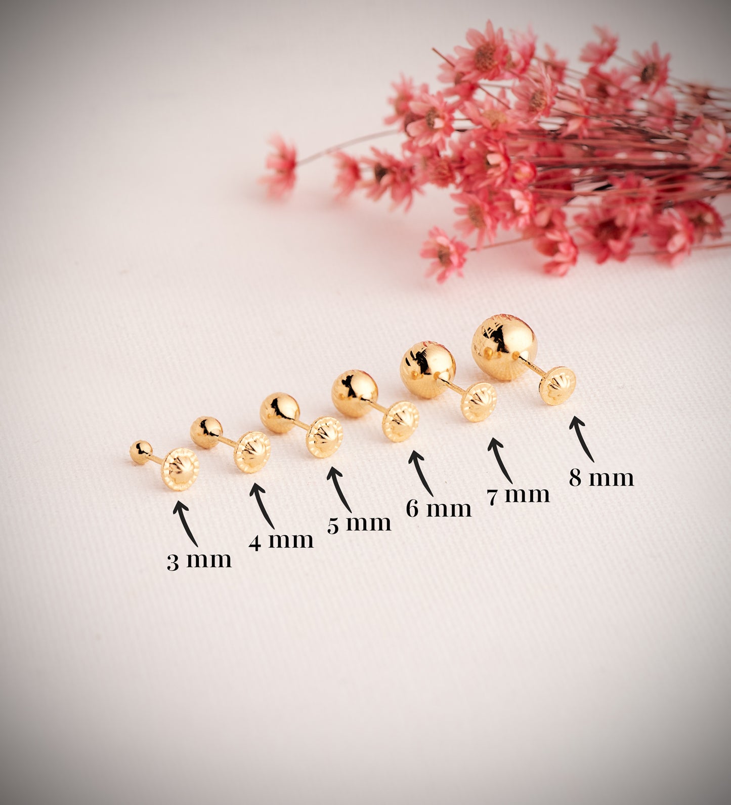 18K PENDIENTES ORO AMARILLO BOLA TALLADA HUECA. ANCHO: 7 MM. CIERRE TUERCA