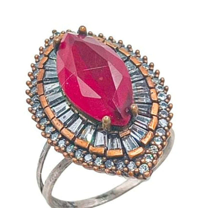 ANILLO PLATA Y BRONCE ACABADO EN PLATEADO ,PIEDRA NATURAL Y CIRCONITAS