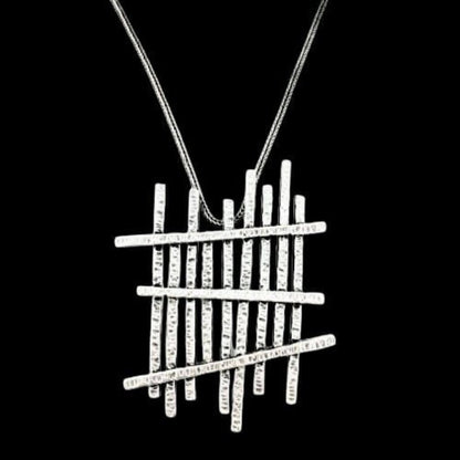 COLLAR ZAMAK CON COLGANTE GEOMETRICO