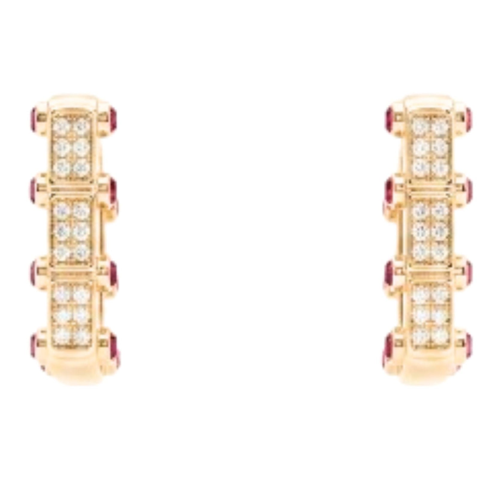 Pendiente de acero inoxidable dorado chapado oro 14ktes circonitas blancas y rojas engastadas diseño joyería osnor moda 