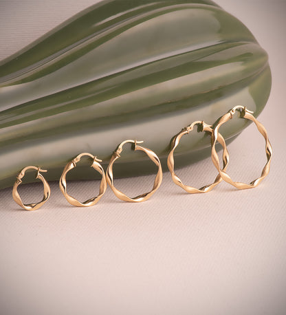 9K AROS ORO AMARILLO HUECOS RETORCIDOS MATE Y BRILLO 24 X 2,5 MM