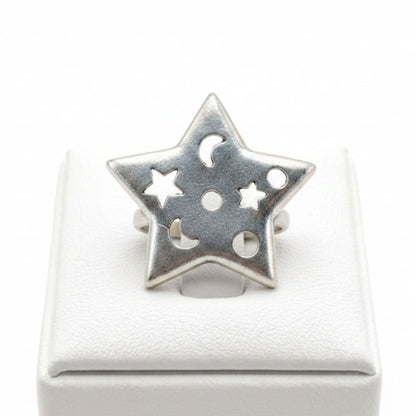 Anillo Zamak mujer estrella de 6 puntas con diseño calado luna y estrella, acabado plateado brillante, Joyería Osnor Zamak