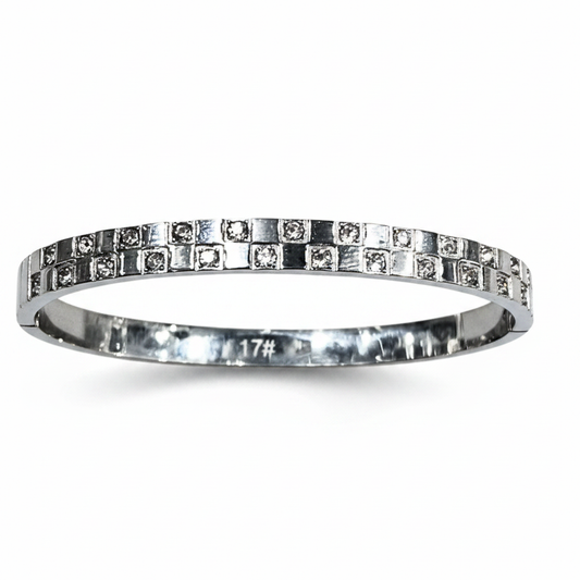 Brazalete fondo blanco acero plateado circonitas diseño joyeria osnor