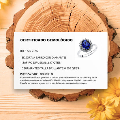 18K SORTIJA ORO BLANCO ZAFIRO 9X7 MM 2,47 QT. DIAMANTES 0,52 QT. VS2-G. MEDIDA: 14X12,5 MM