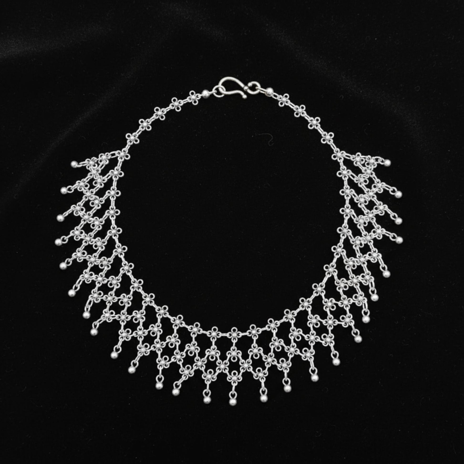 Collar zamak de cadena con eslabones florales efecto cascada, joyería Osnor Zamak