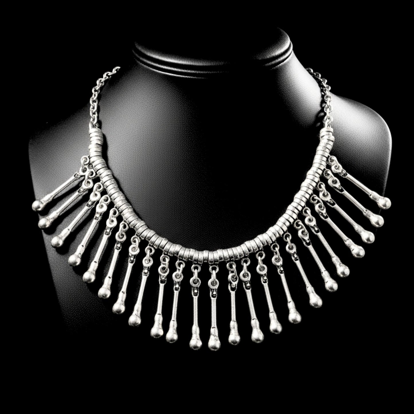 Collar babero de zamak plateado con flecos de varillas y bolitas en cascada, estilo étnico Joyería Osnor Zamak
