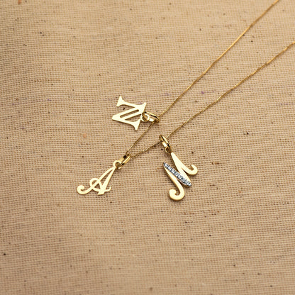 18K COLGANTE ORO AMARILLO LETRA " L " . 10X8 MM