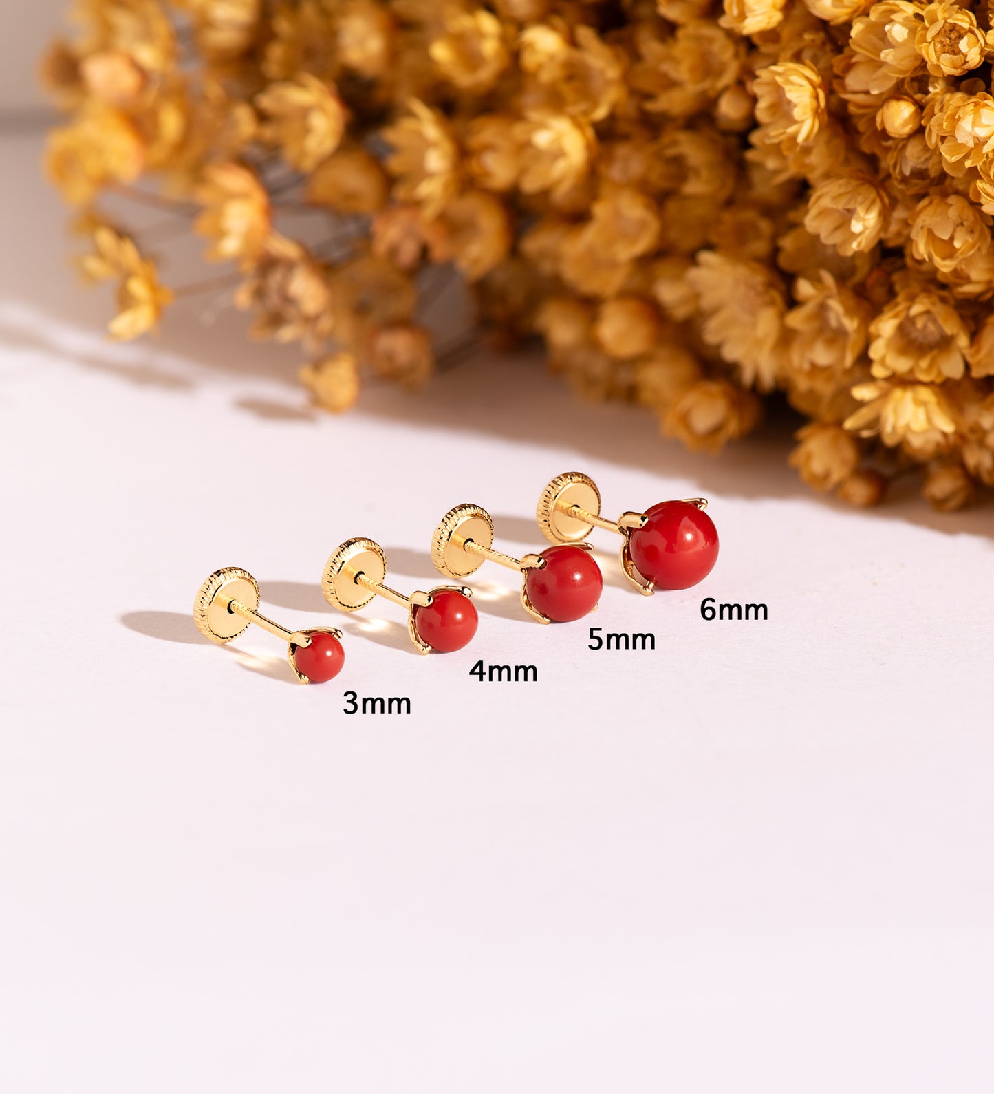 18K PENDIENTES ORO AMARILLO CORAL CON 4 GARRAS. MEDIDA: 5 MM. CIERRE TUERCA