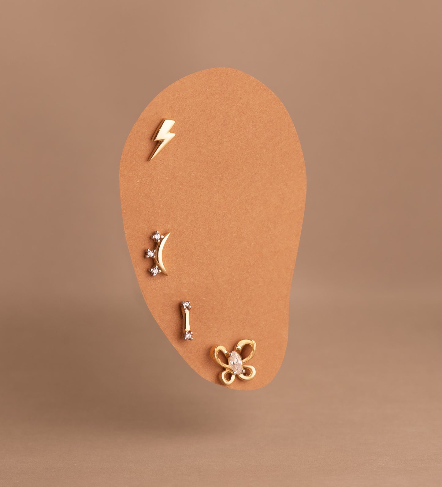 18K PIERCING ORO BICOLOR BARRA CON CIRCONITAS. MEDIDA: 6X2 MM. CIERRE TUERCA