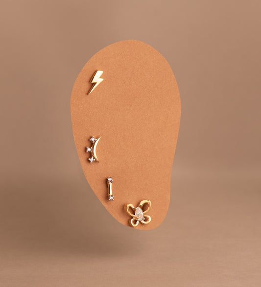 18K PIERCING ORO BICOLOR LUNA CON CIRCONITAS. MEDIDA: 8X4 MM. CIERRE TUERCA