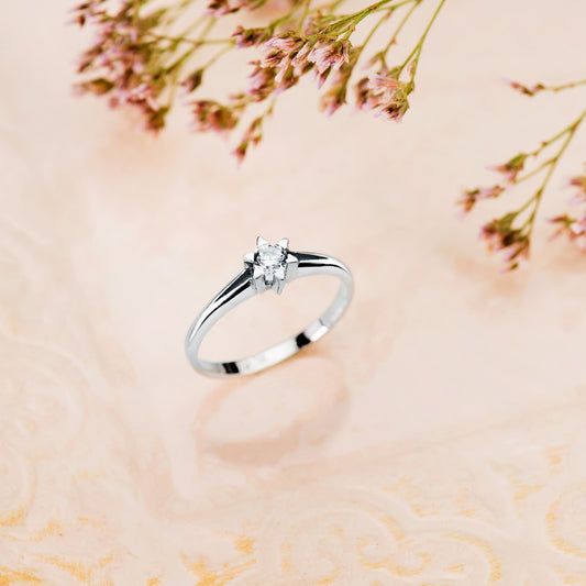 18K SOLITARIO DIAMANTE NATURAL TALLA BRILLANTE ORO BLANCO 0.200 QTS. SI-H