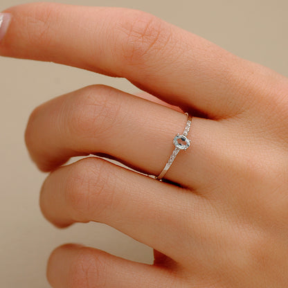 18K SORTIJA ORO BLANCO DIAMANTES DE LABORATORIO 0,030 QTS OVAL AGUAMARINA NATURAL 4X3 MM CUERPO 1,30 MM VS2-G