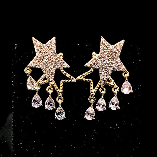 pndientes estrellas 3d acero dorado diseño joyeria osnor