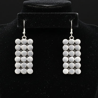 Pendientes Zamak Bolas Plateadas Volumen | Joyería Osnor