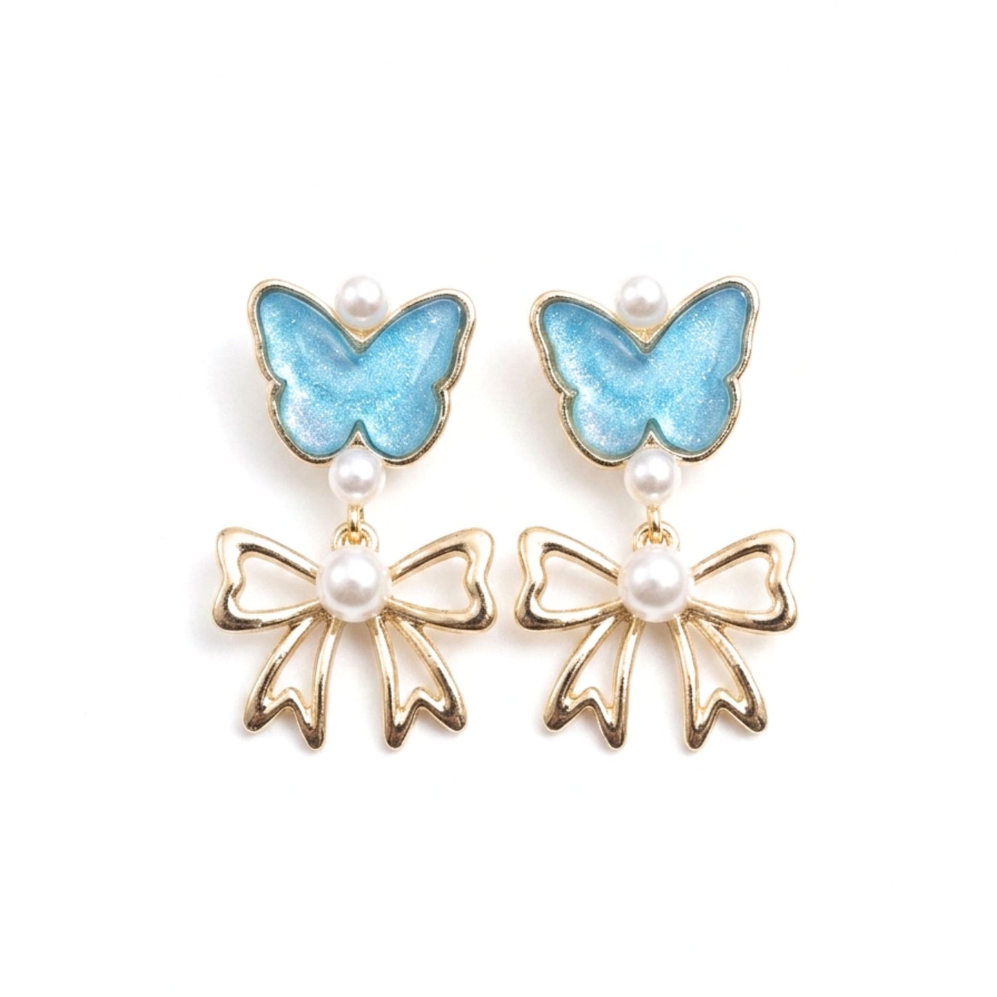 Pendientes Acero inoxidable dorado chapado oro 14ktes cierre presion mariposa nácar azul lazo dorado brillo perla diseño joyería osnor moda 