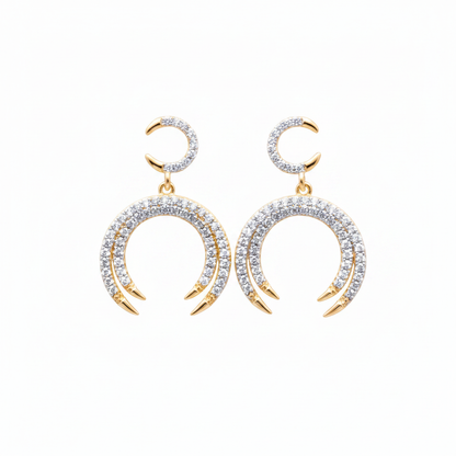 Pendientes circonitas blancas con marco dorado