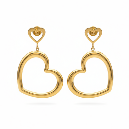 Pendientes corazón fondo blanco acero dorado diseño joyeria osnor