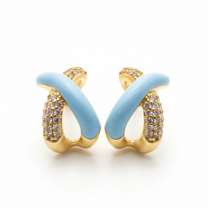 Pendientes fondo blanco acero chapado oro 14ktes. ceramica azul joyeria osnor
