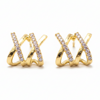 Pendientes X dorados fondo blanco