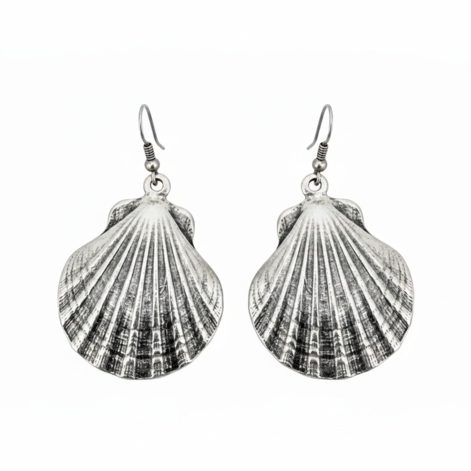 pedientes de zamak forma caracola mujer largos exclusivos joyeria osnor zamak