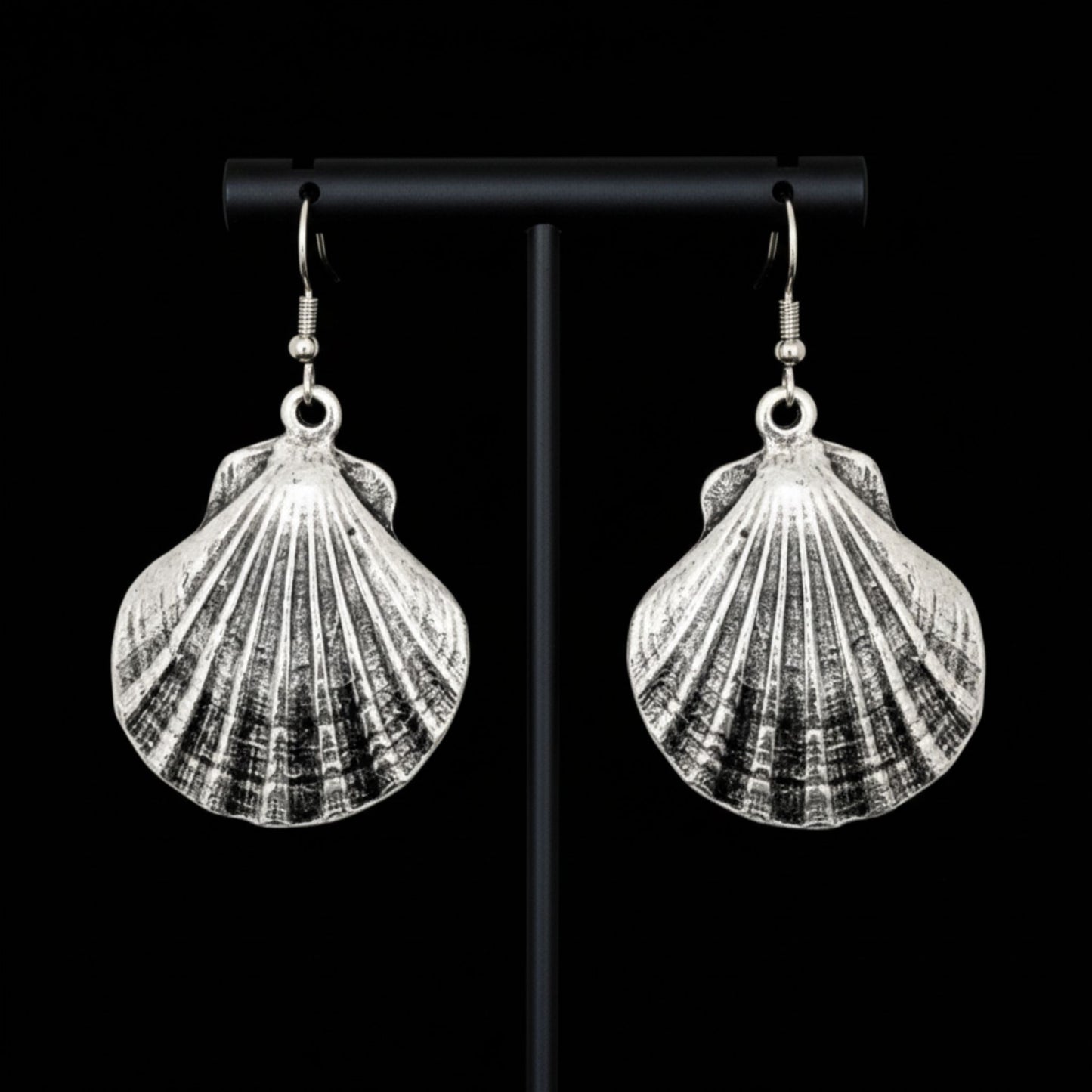pedientes de zamak forma caracola mujer largos exclusivos joyeria osnor zamak