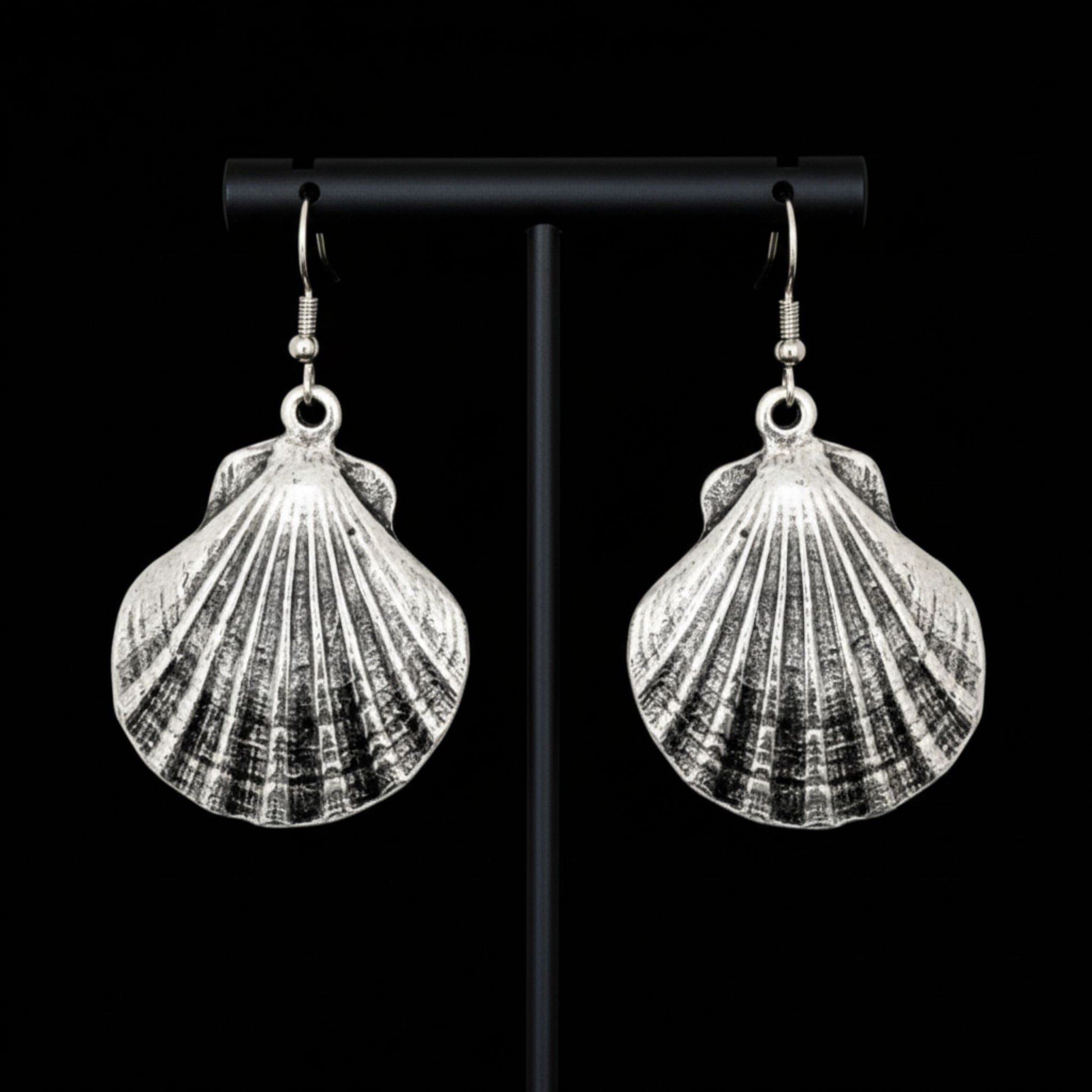 pedientes de zamak forma caracola mujer largos exclusivos joyeria osnor zamak