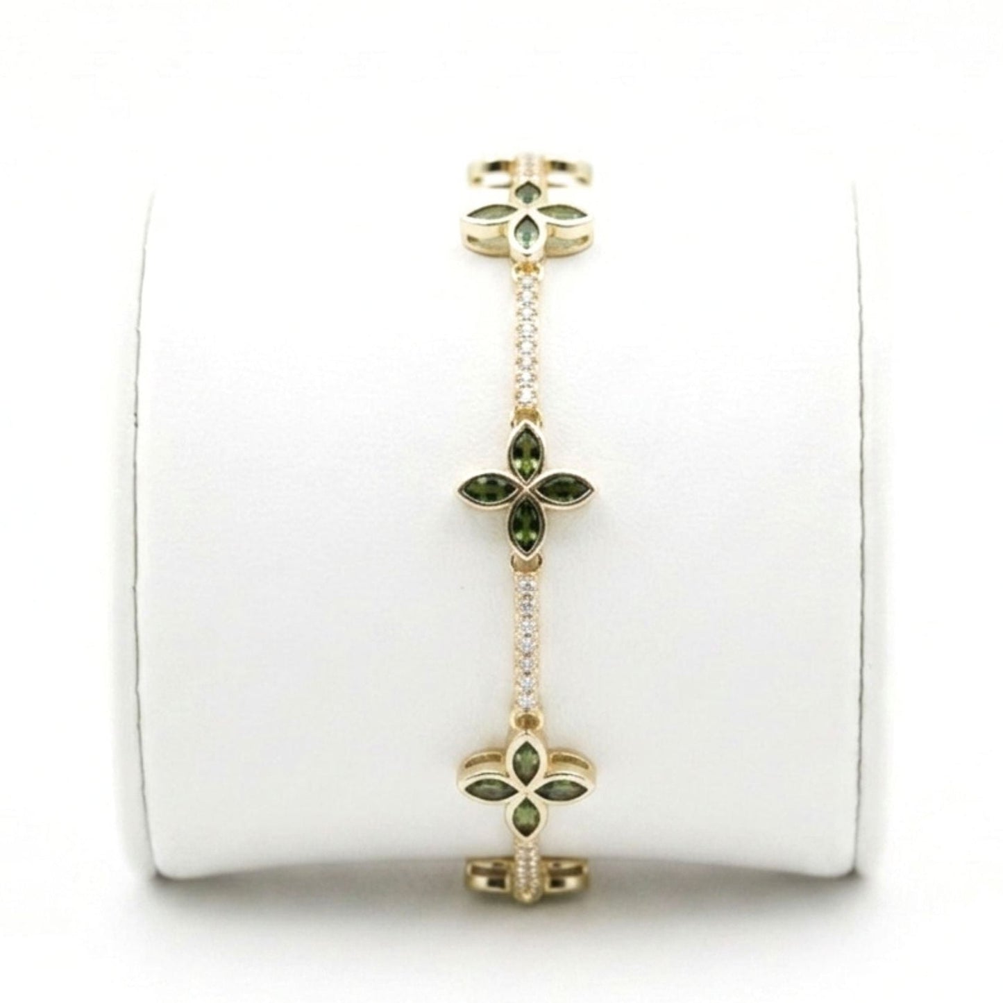 Pulsera de acero inoxidable dorado chapado oro 14ktes circonitas blancas engastadas y verdes diseño joyería osnor 