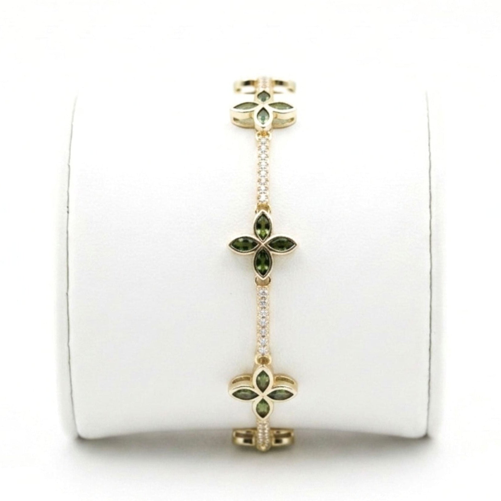 Pulsera de acero inoxidable dorado chapado oro 14ktes circonitas blancas engastadas y verdes diseño joyería osnor 
