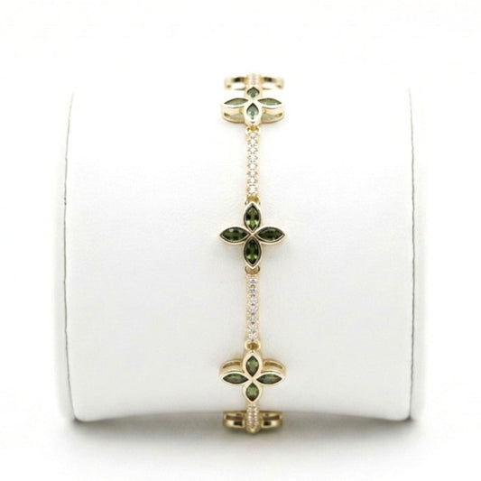 Pulsera de acero inoxidable dorado chapado oro 14ktes circonitas blancas engastadas y verdes diseño joyería osnor 