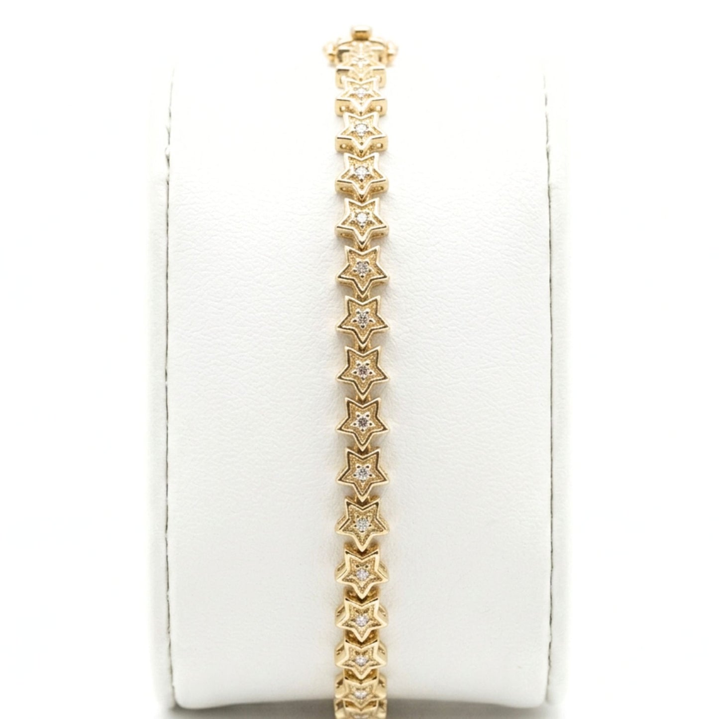 Pulsera acero inoxidable dorado chapado oro 14ktes circonitas blancas engastadas diseño joyería osnor estrella