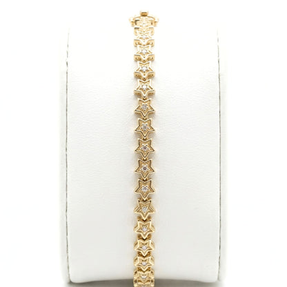 Pulsera acero inoxidable dorado chapado oro 14ktes circonitas blancas engastadas diseño joyería osnor estrella