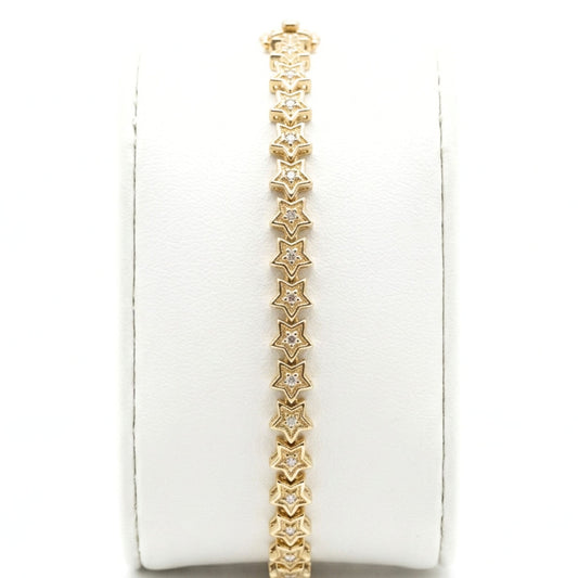 Pulsera acero inoxidable dorado chapado oro 14ktes circonitas blancas engastadas diseño joyería osnor estrella