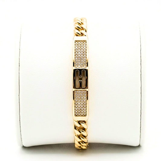 Pulsera de acero inoxidable dorado chapado oro 14ktes circonitas blancas engastadas diseño joyería osnor moda unisex 