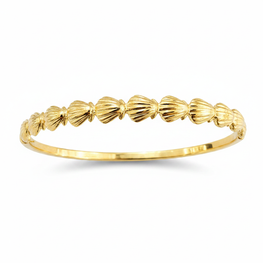 Brazalete dorado sobre fondo blanco acero dorado diseño joyeria osnor