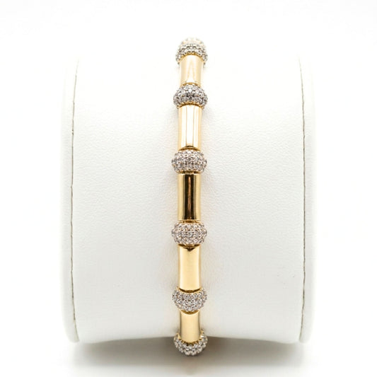 Pulsera acero inoxidable dorado chapado oro 14ktes circonitas blancas engastadas diseño joyería osnor moda moderno mujer 