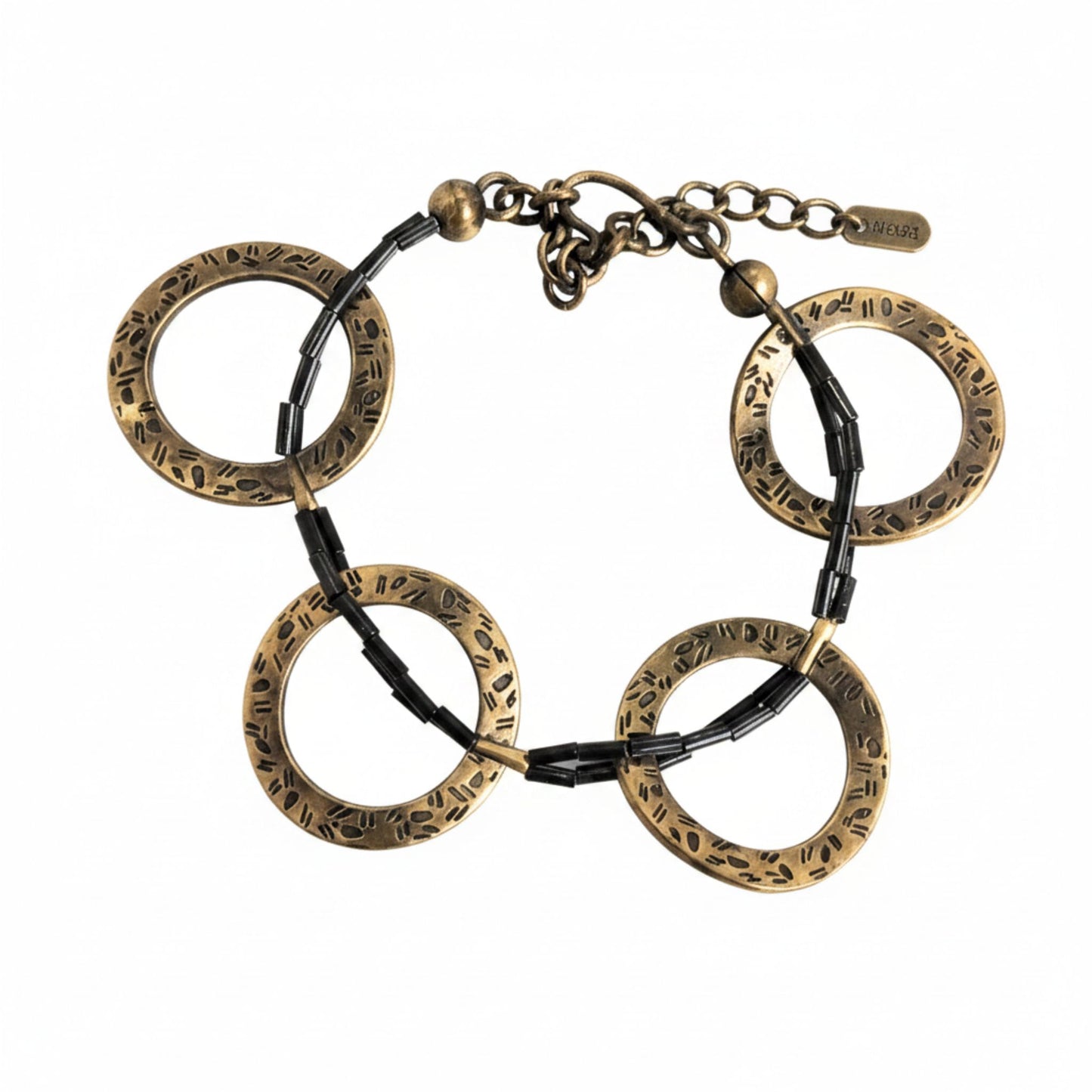 pulsera de bronce dorado envejecido y piel negra diseño exclusivo unisex joyeria osnor zamak