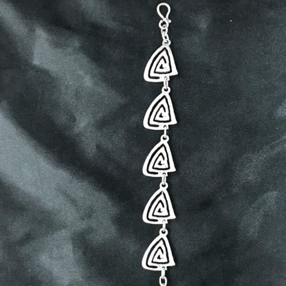 Pulsera Zamak triángulos espirales concéntricas extensible hipoalergénica Joyería Osnor Zamak