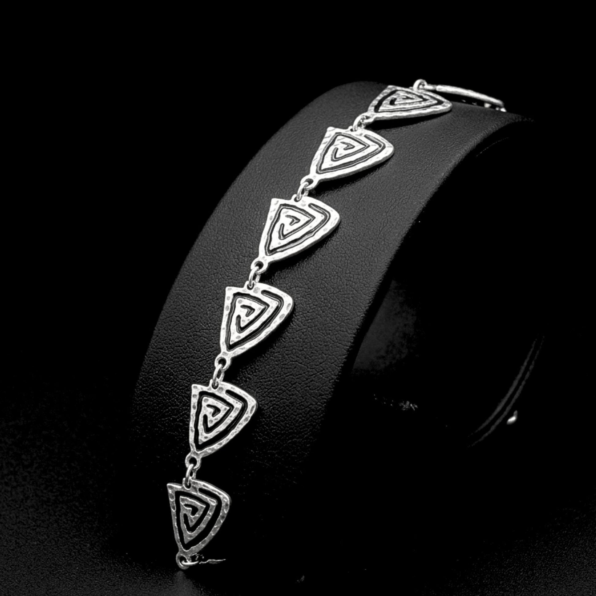 Pulsera Zamak triángulos espirales concéntricas extensible hipoalergénica Joyería Osnor Zamak